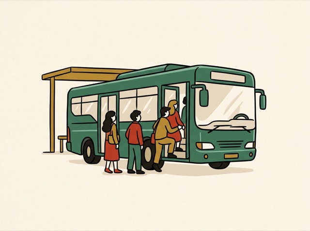 A city bus at a stop, people queuing to board